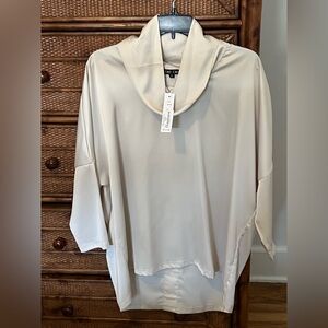 NWT Boho Chic Cream Silky Top. 3/4 Length Sleeves. Buttons down the back.